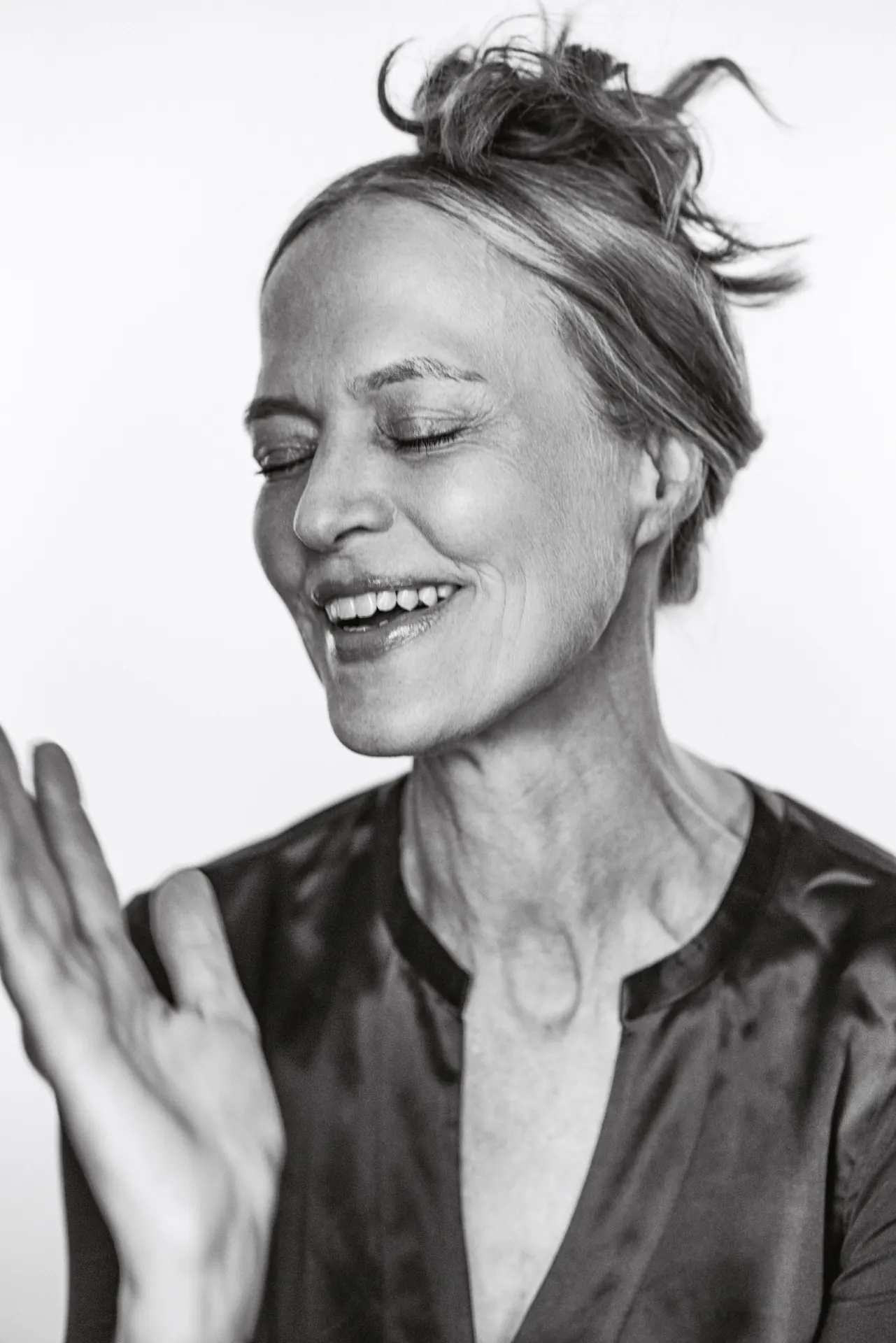 Woman laughing, black and white portrait